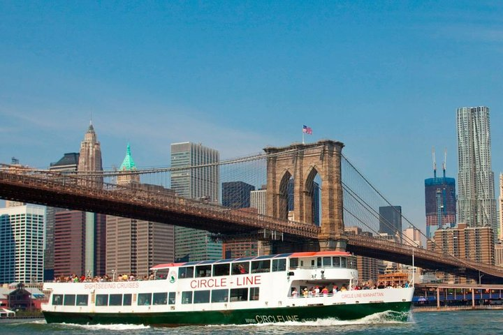 Experience the iconic Circle Line cruise showcasing stunning views of Manhattan's skyline and landmarks all while enjoying comfortable seating and a leisurely two-and-a-half-hour journey around the island.